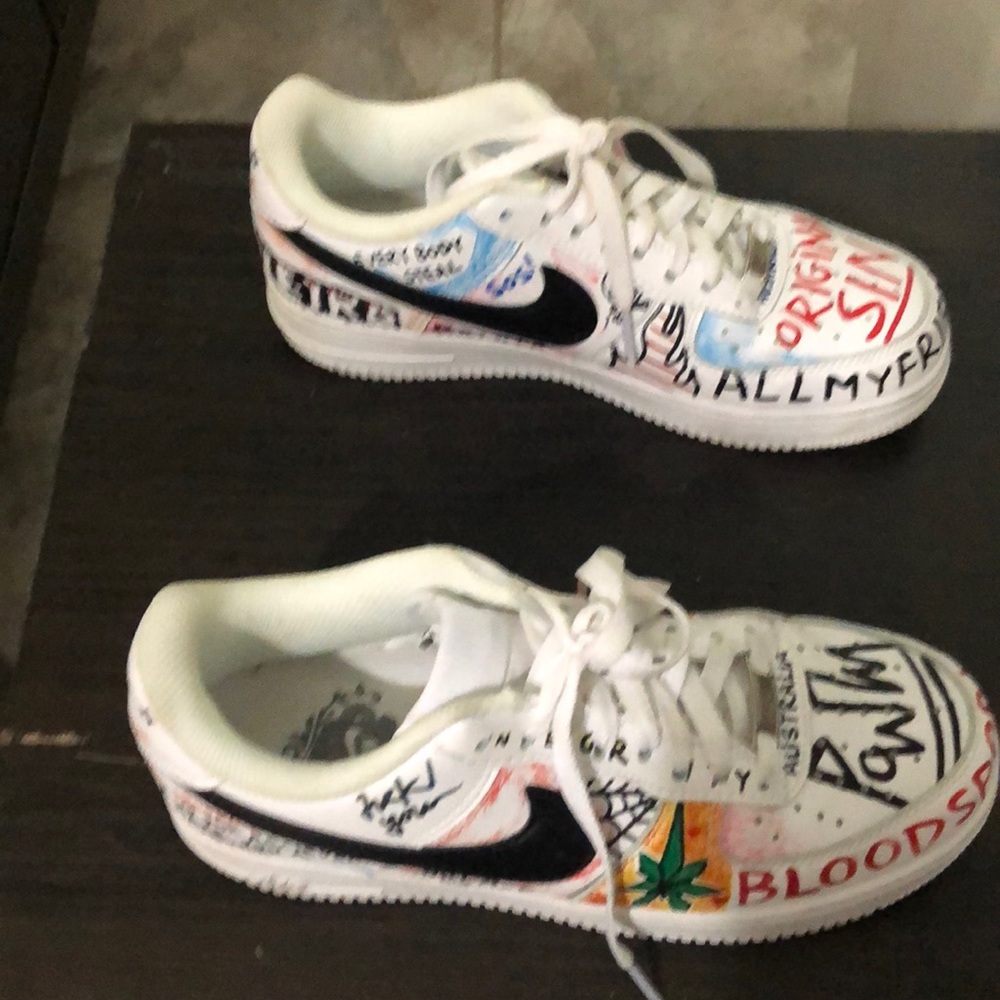 Custom Nike Air Force ones. Pauly graffiti style.
